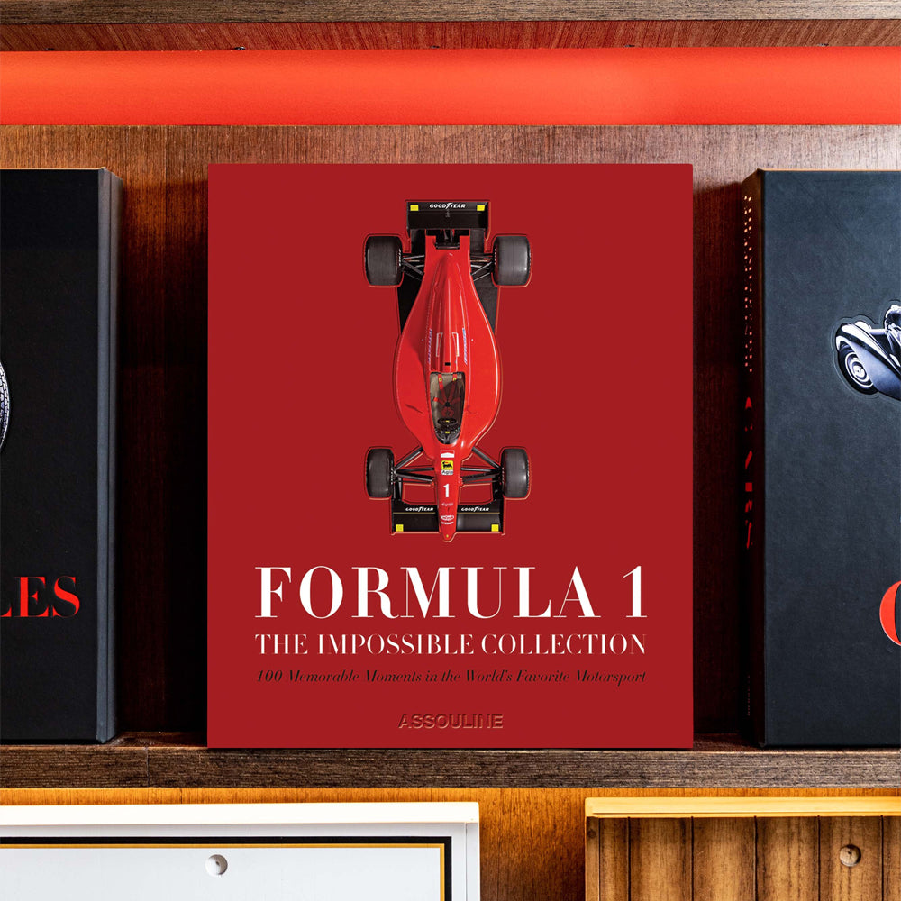 Assouline Formula 1: The Impossible Collection book on a shelf