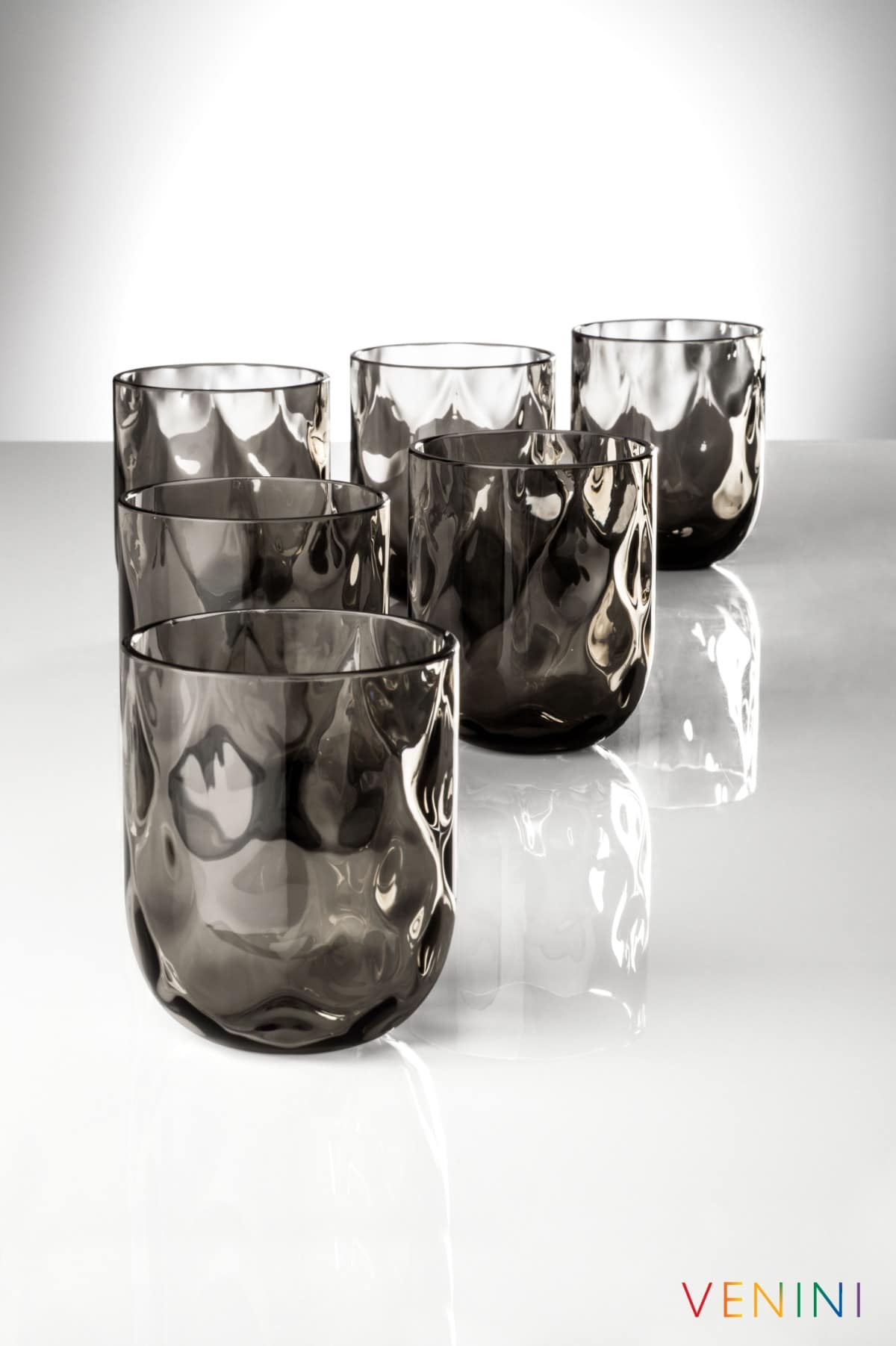 Venini Carnevale tumblers in smoky grey glass with a rippled surface