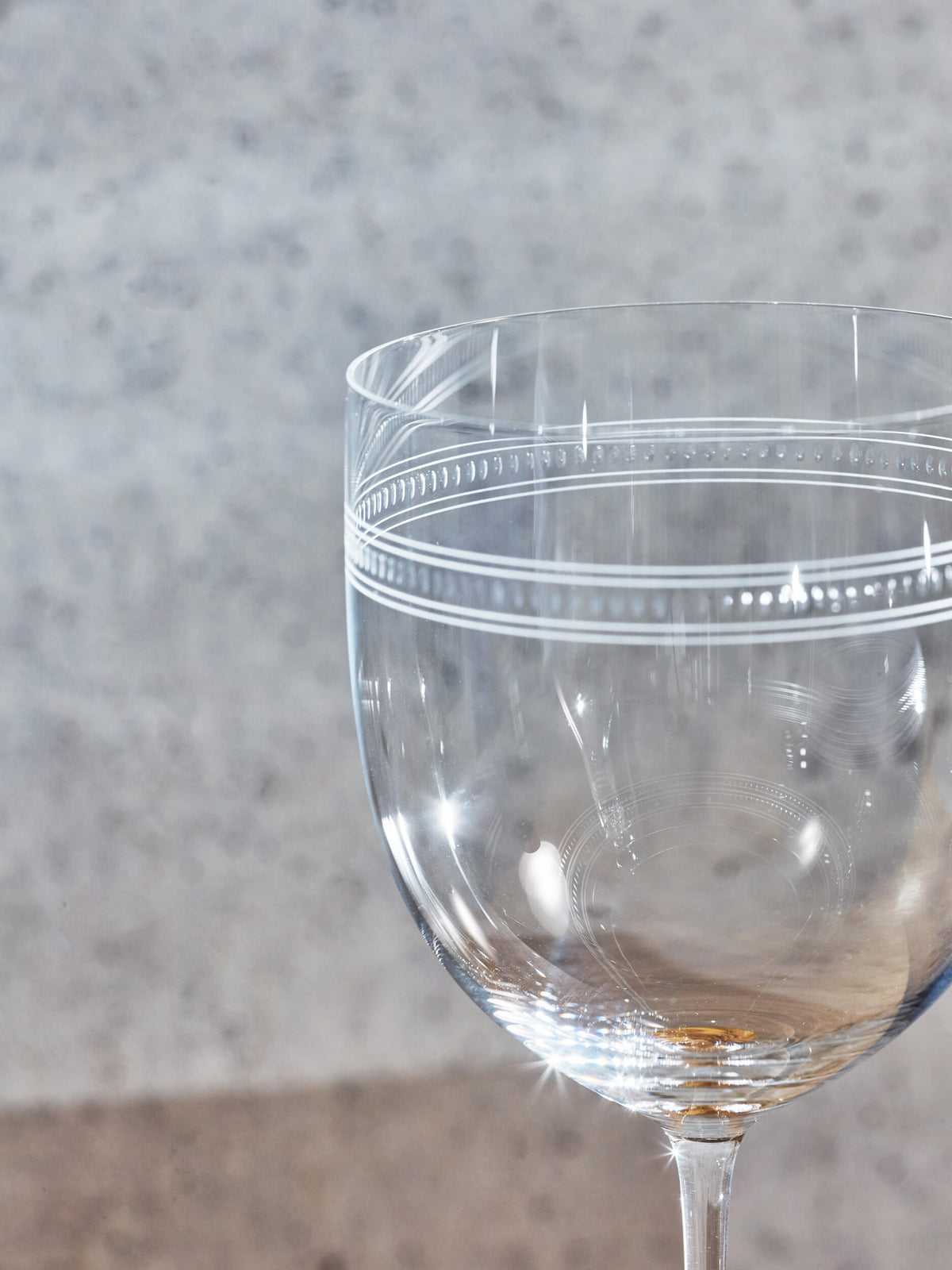 Close-up of an engraved Lobmeyr wine glass