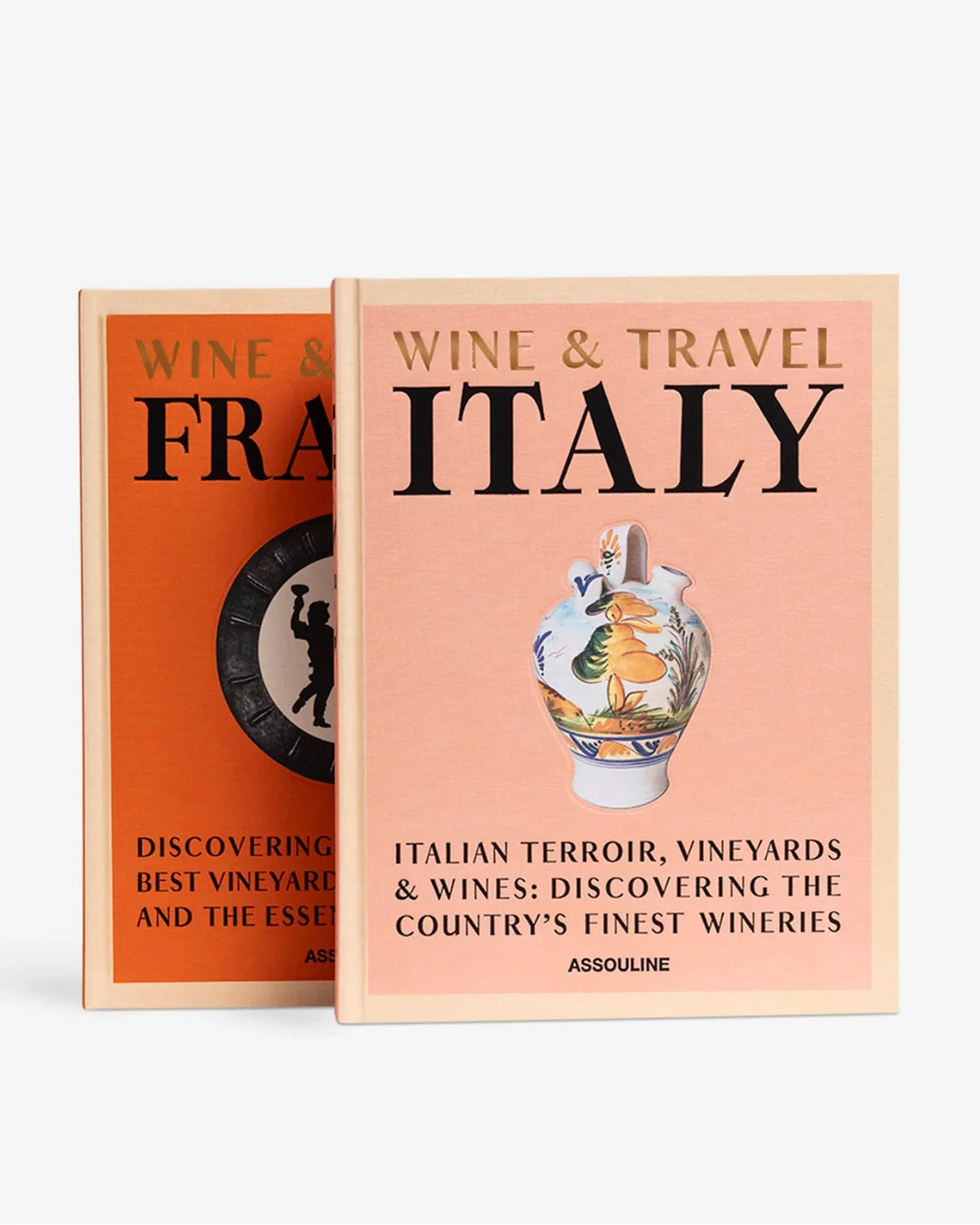 The Wine & Travel France and Wine & Travel Italy books by Assouline, with illustrated orange and pink covers