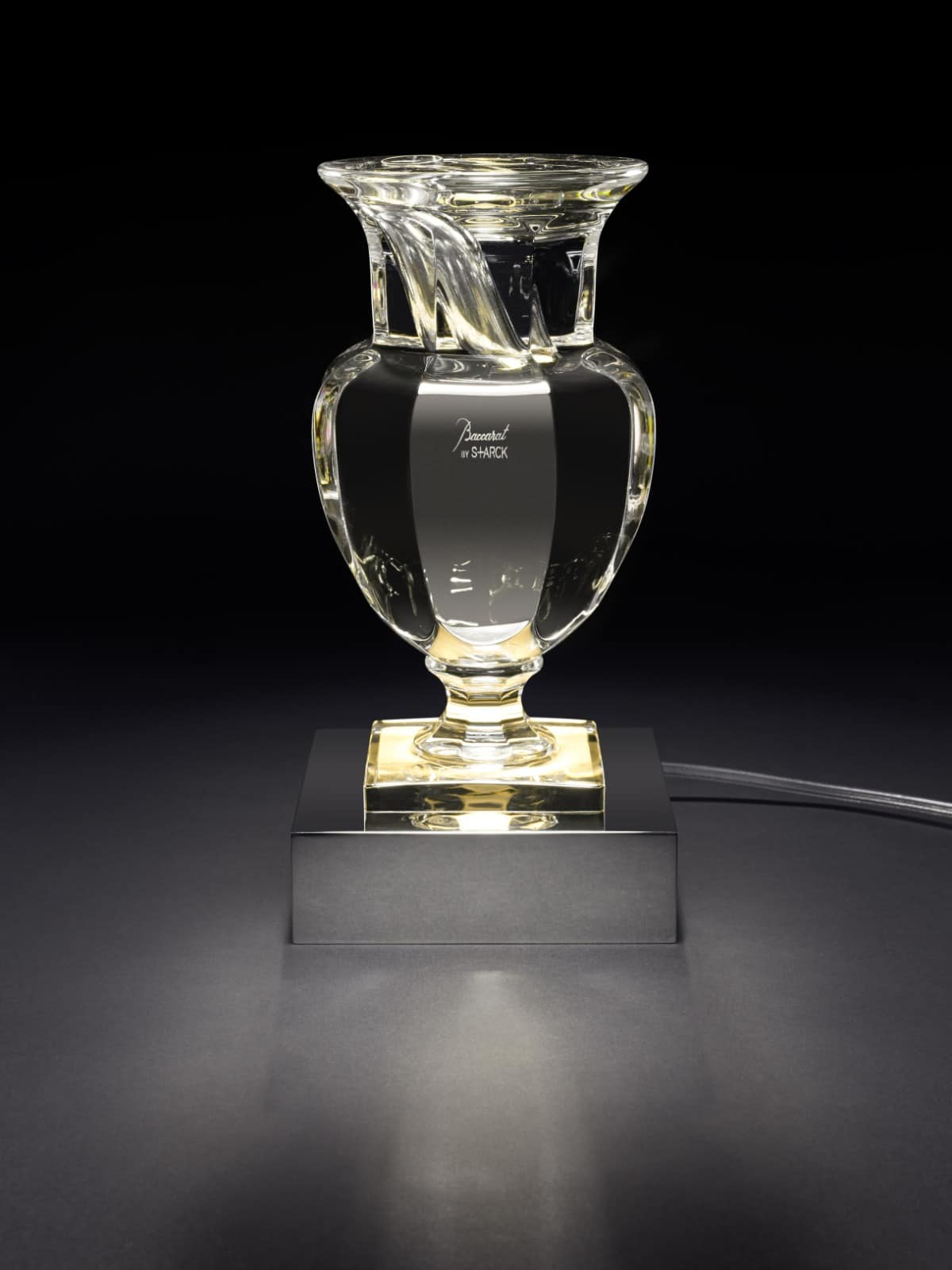 Baccarat by Starck crystal lamp on an illuminated base