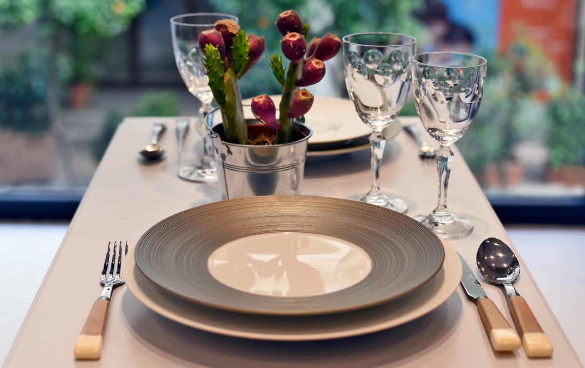 Table set with J.L. Coquet plates and crystal glasses