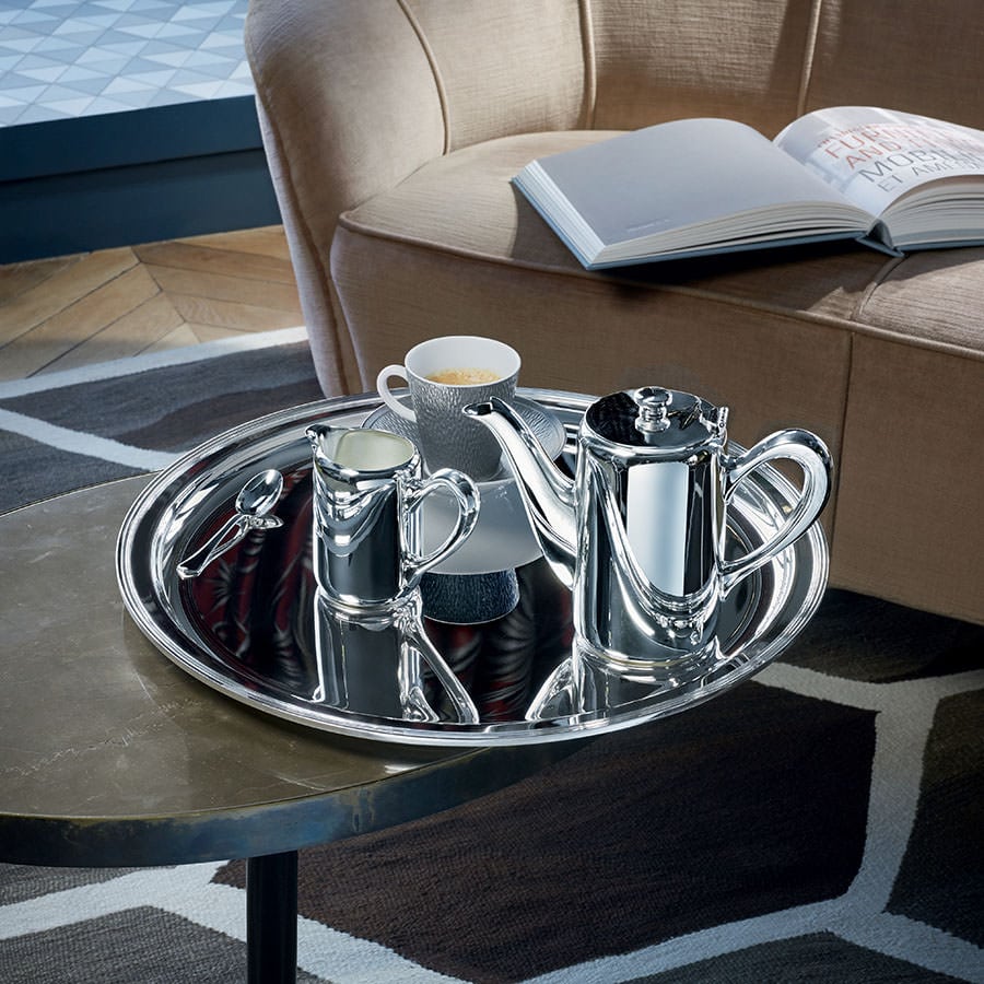 Ercuis silver coffee pot, milk jug and cup on a round silver tray