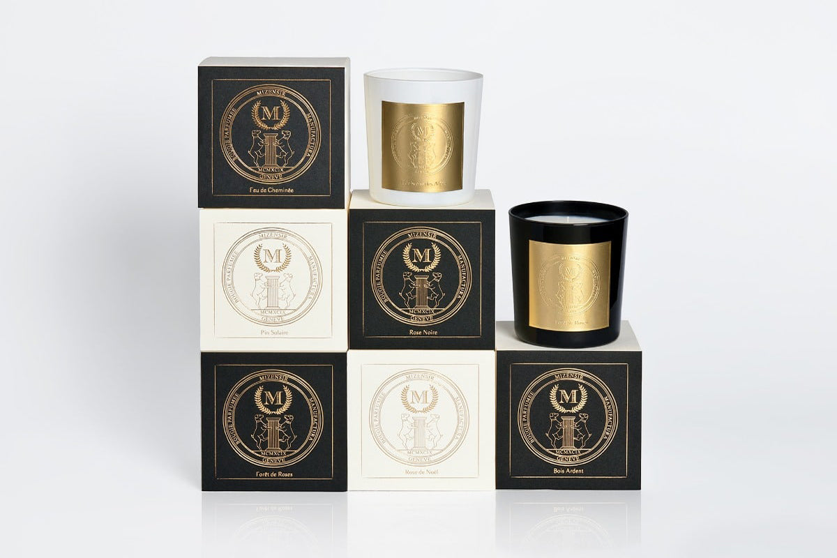 Mizensir scented candles and their black, white and gold boxes