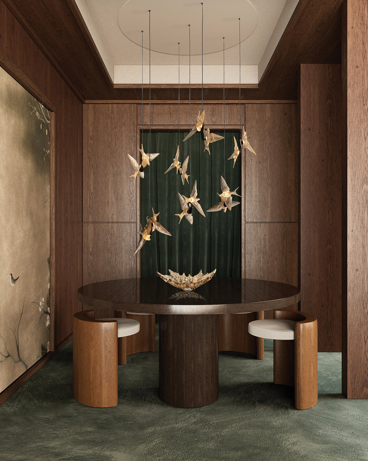 Dining room with a hanging installation of gold Lalique crystal birds