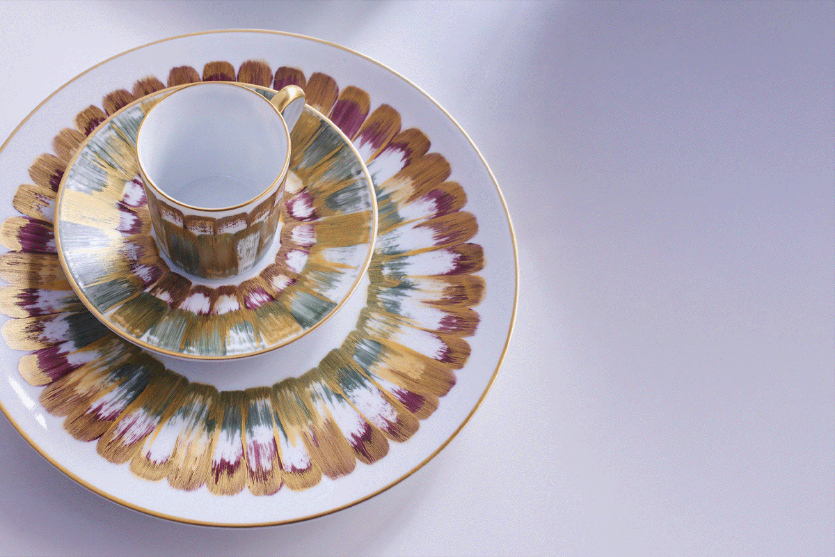 Marie Daâge hand-painted cup, saucer and plate with gold and purple brushstrokes